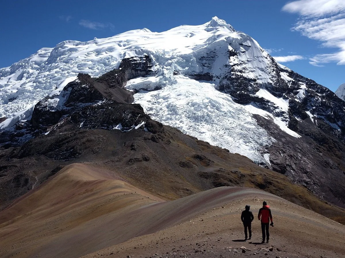 Trekkers below the Ausangate glacier, Cusco